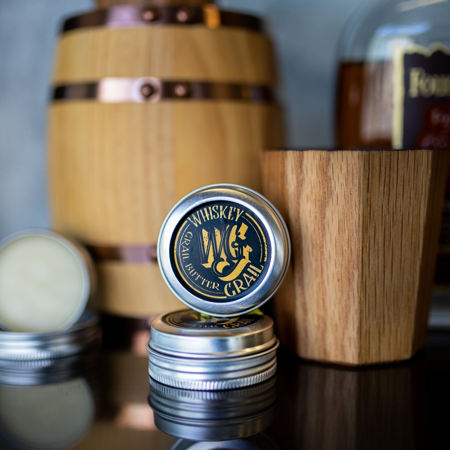 A tin of Grail Butter, used for maintaining your Whiskey Grail or Whiskey Tumbler.